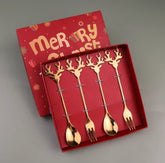 Christmas stainless steel spoons and forks in silver presentation.